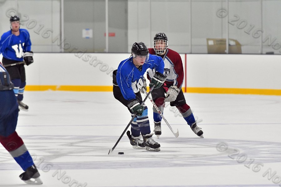 Wheaton College Men\'s Ice Hockey vs Middlesex Community College. - Photo By: KEITH NORDSTROM